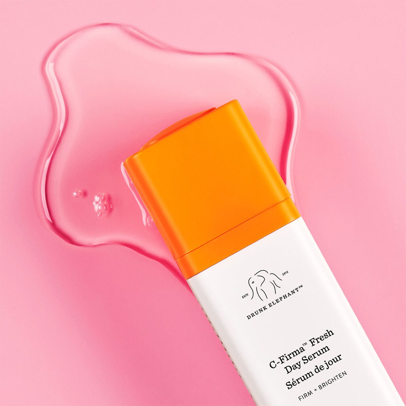 C-firma in a pool of serum on a pink background.